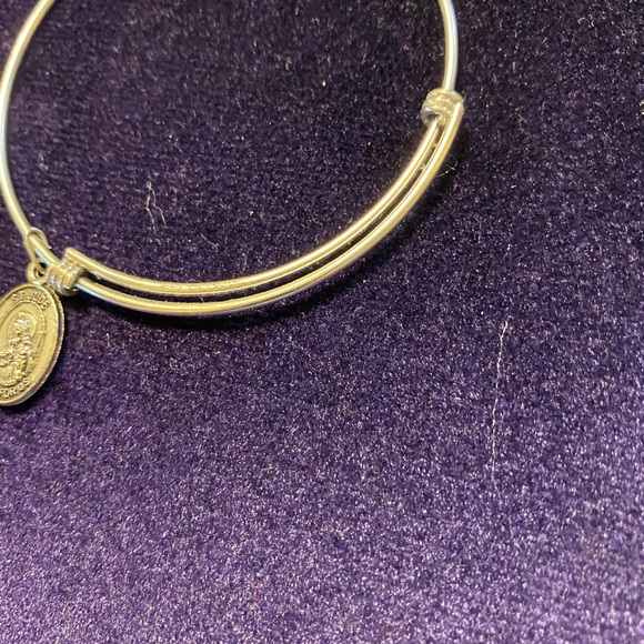 5/$50 Adjustable Silver Bracelet
With a silver double sided Medallion - Picture 6 of 10